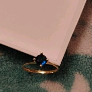 Elegant Gold Ring with Blue Stone